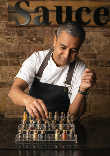 Chef selecting spices